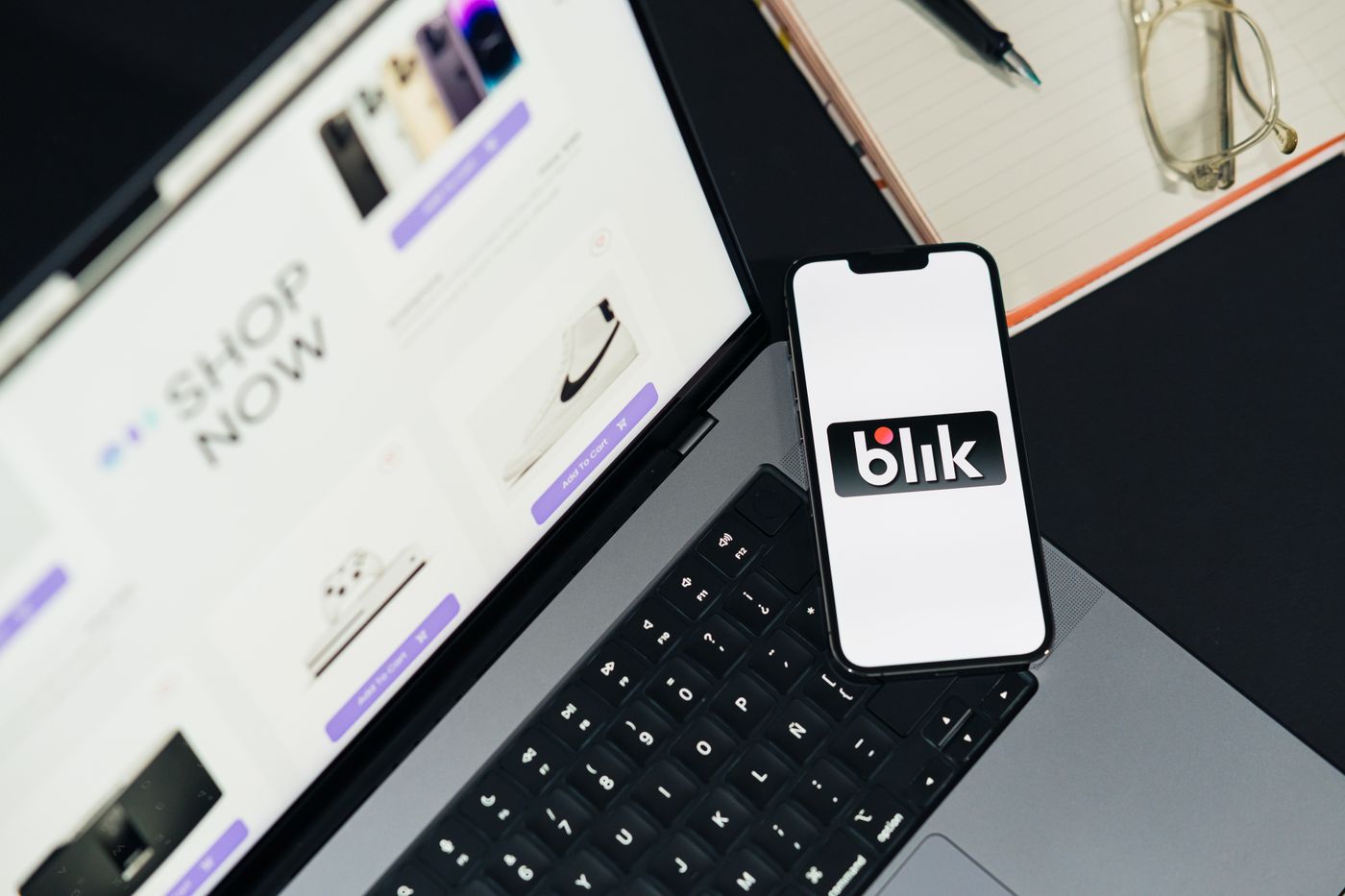 Online shop displayed on a laptop and smartphone